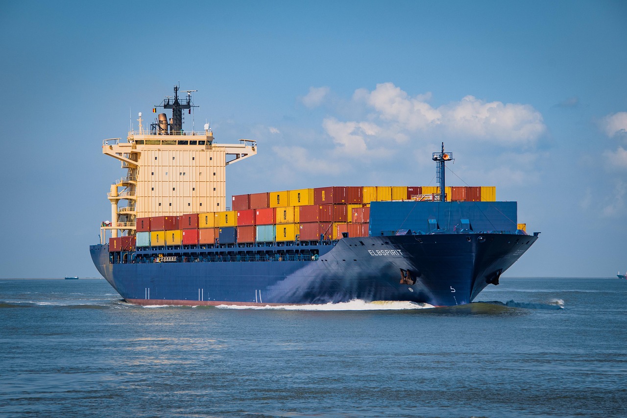 Container ship on water representing global logistics